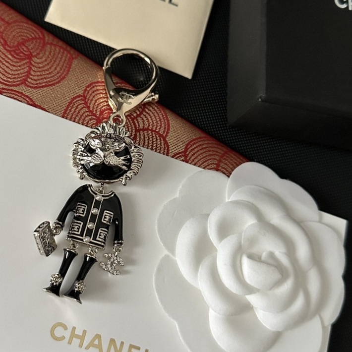 Ch*el brooches